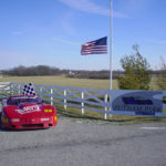 "Thanks Jim!" Ashton Motorsports Display at Putnam Park Entrance Along Funeral Procession (Ian Linn)