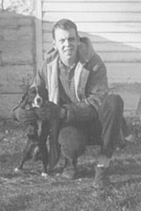 With his dog, Skunky.