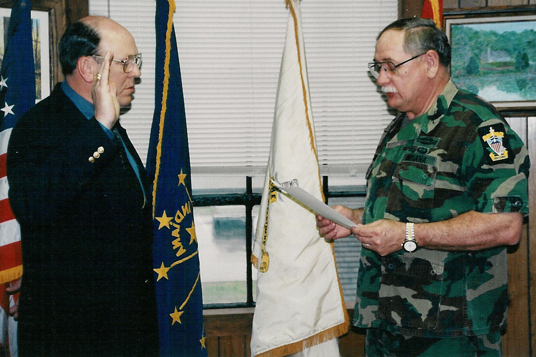 Swearing in to his Indiana Defense Force service.